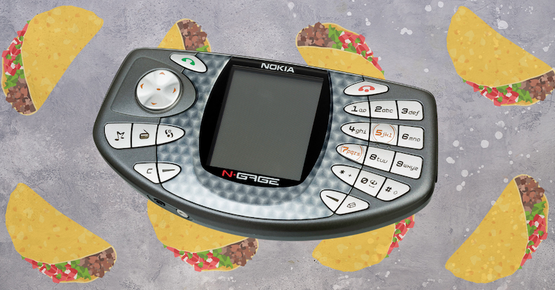 A cell phone shaped like a taco shell superimposed on top of images of filled taco shells.